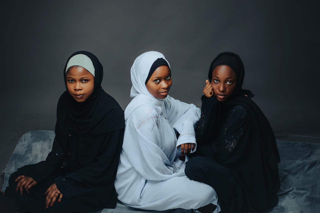 Models in Black and White Traditional Muslim Clothes